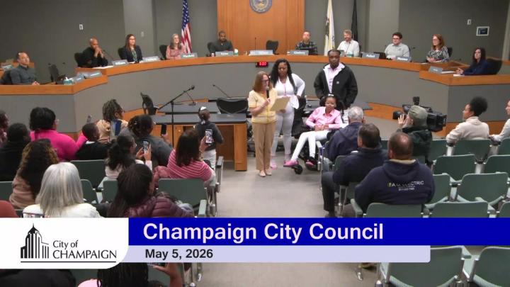 Mayor standing in front of Dais delivering proclamation